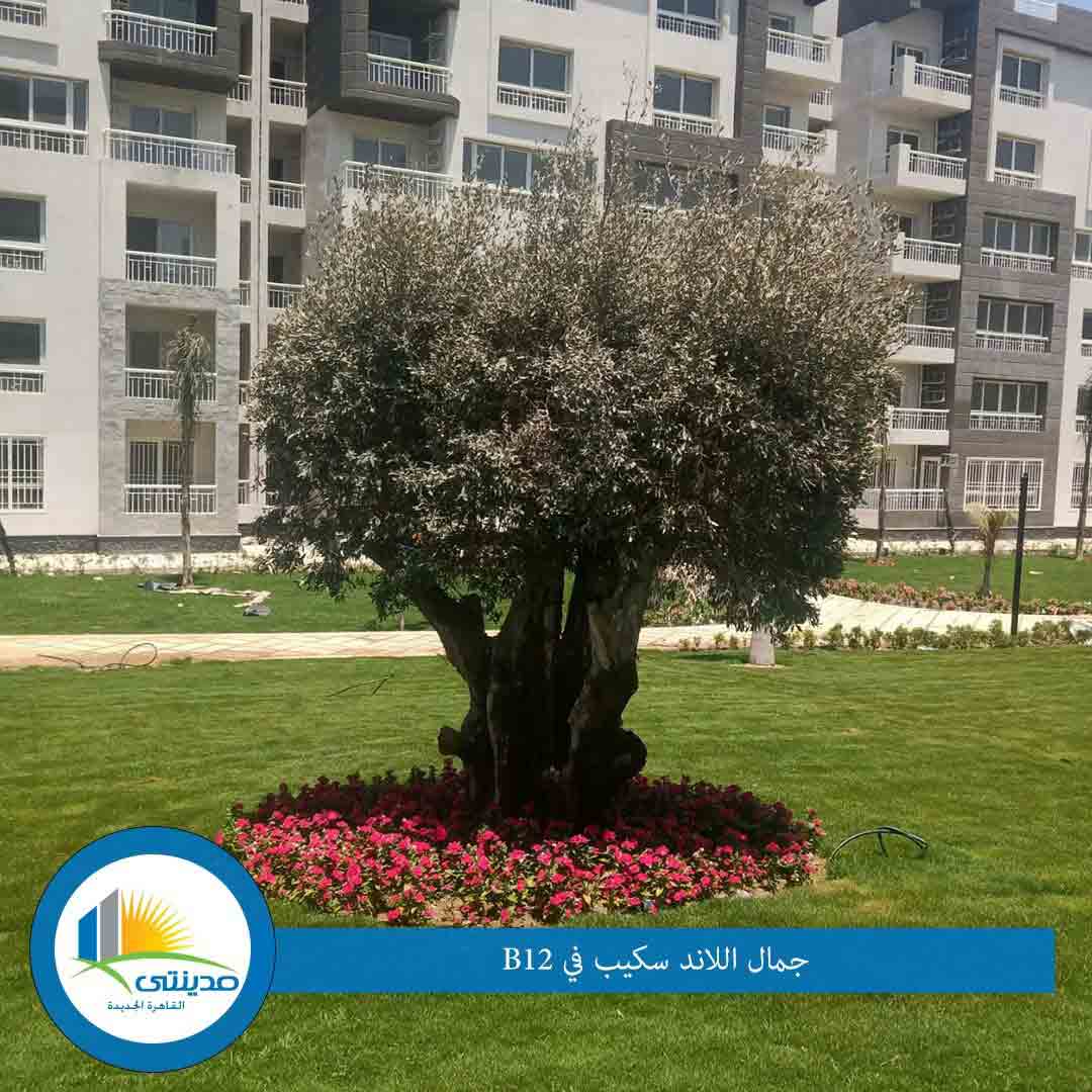 شقه للبيع بمدينتي  200 متر في الb12 تشطيبات تطل علي جاردن