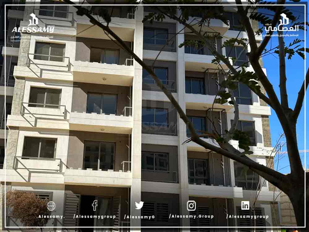 شقه للبيع بمدينة نور بتسهيلات علي 12 سنه في b2 بمجموعه 21 تش